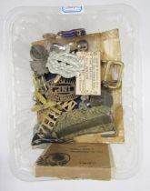 Collection of British military cloth and brass badges, cased War Office rifle club medal, cased
