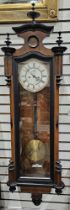 19th century Vienna-style walnut regulator clock, with a white enamel dial, with black Arabic