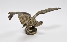 Gilt metal eagle car mascot after the model by Charles Paillet, cast with its wings outstretched, on