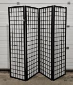 Contemporary Japanese style folding pierced ebonised wooden screen, formed from four folding