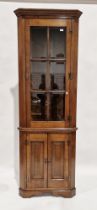 20th century Georgian style oak corner cabinet with glazed top section above cupboard, by Kevin P.