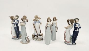 Six boxed Lladro figures, printed marks, including a figure of a young girl holding a kitten, a