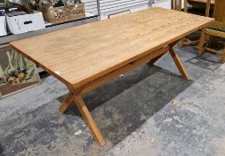 Large 20th century pine dining table of rectangular form, raised on an X-frame, 74cm high x 183cm