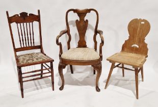 Late 19th/early 20th century oak hall chair with spindle back and upholstered seat base, having