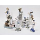 Group of Lladro, Nao, Rex and other porcelain figures similar, including a Lladro group of a girl