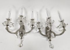 Pair of triple light glass wall sconces, each with 18th century-style nozzles and faceted drops,