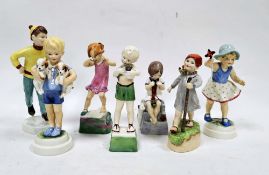 Seven Royal Worcester bone china models of children from the Days of the Week series, all on