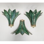 Set of three modern green glass and brass mounted wall lights of stylised Art Deco leaf design (