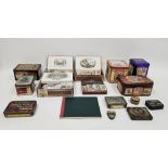 Collection of vintage tins and cigar boxes containing assorted cigarette cards including Wills, John