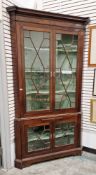 Large Victorian mahogany glazed corner display cabinet in two sections, the top section having two