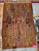 20th century Baluchi rug, with bands of stylised flowerheads with geometric fields, in brown, red