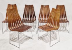 Hans Brattrud (Norwegian, 1933-2017) Set of four 'Scandia' rosewood chairs and two teak examples