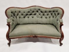 Victorian mahogany-framed parlour sofa, with scroll button back and foliate carved frame,