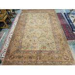 Modern cream ground Royal Keshan wool pile carpet with central floral pattern, multiple floral and