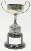 20th century silver plated twin handled trophy, adorned with numerous engravings for the 'W.F.W.I'