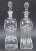 Pair of late 19th century engraved glug-glug decanters and stoppers, each engraved with birds,
