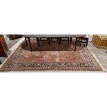 Eastern salmon ground carpet with floral field, mutiple floral borders, 322cm x 266cm