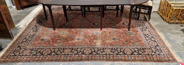 Eastern salmon ground carpet with floral field, mutiple floral borders, 322cm x 266cm