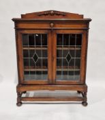 Early 20th century oak and leadlight glazed cabinet with triangular pediment top, pair of leaded