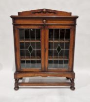 Early 20th century oak and leadlight glazed cabinet with triangular pediment top, pair of leaded