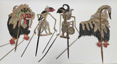Collection of Indonesian shadow puppets including articulated paper and vellum examples with