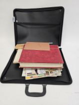 All world stamps: Muddled accumulation in black zip folder in 2 stock-books, 2 albums, approvals