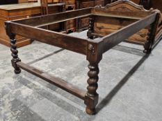 Contemporary oak 4' bedframe designed by Nigel Payton, with later pine slats, raised on