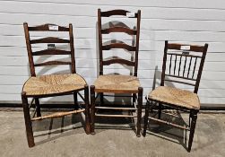 Pair of oak ladderback dining chairs with rush seats, 91cm high, another pair of ladderback chairs