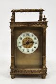 Late 19th century Bishop & Son (Trowbridge) brass mounted carriage clock, the ivorine chapter ring