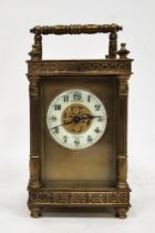 Late 19th century Bishop & Son (Trowbridge) brass mounted carriage clock, the ivorine chapter ring