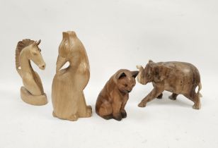 Carved wooden model of a cat looking skywards, 36cm high, another wooden model of a cat, a carved