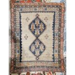 Eastern mushroom ground rug, central panel with joined lozenges to floral borders, 154cm x 110cm