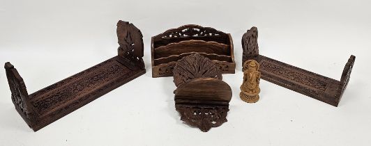 Carved hardwood stationery rack, two carved hardwood book slides, etc