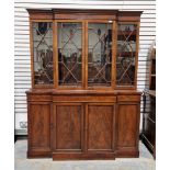 Early 20th century mahogany breakfront library bookcase, the moulded cornice above astragal glazed