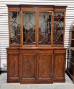 Early 20th century mahogany breakfront library bookcase, the moulded cornice above astragal glazed