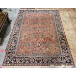 Large Eastern salmon ground rug with floral field to floral border, 279cm x 198cm Condition Report