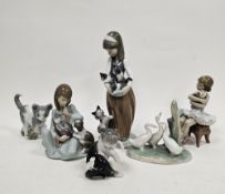 Group of Lladro and Nao figures and models of animals, including a Lladro figure of a girl seated