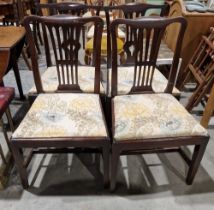 Matched set of seven Victorian mahogany dining chairs each with slatted splat backs and single