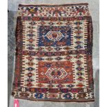 19th century Turkish cream ground kilim with two central geometric medallions enclosed by hooked