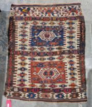 19th century Turkish cream ground kilim with two central geometric medallions enclosed by hooked