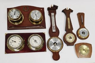 Two pairs of mounted bulkhead style barometer and clock sets, one quartz by Metamec, the other