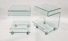 Pair of contemporary glass occasional tables by Calligaris, each of square section, raised on