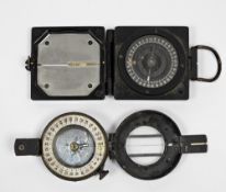 Two WWII military issue marching compasses by T.G. Co.Ltd (London), the first No. B271945, MK 1,