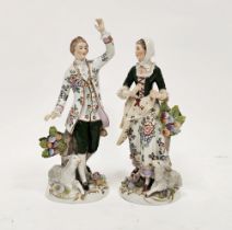 Pair of Sitzendorf porcelain models of a shepherd and companion, late 19th century, printed