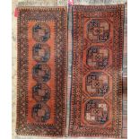 Two Afghani red ground runners, one with four central quartered elephant foot guls to multiple