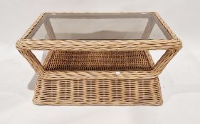 Modern wicker occasional/coffee table of rectangular form with tinted glass top, 44cm high x 84cm