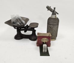 Pair of balance scales, a soda syphon and a pair of postal scales (3)