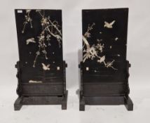 Pair of 20th century Japanese mother-of-pearl inlaid lacquered firescreens on stands, decorated with