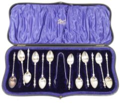 Edwardian silver set of 12 apostle-top teaspoons with matching sugar nips, Sheffield 1910, makers