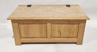Panelled striped oak coffer with riveted iron hinges, on stile feet, 47cm x 106cm x 53cm